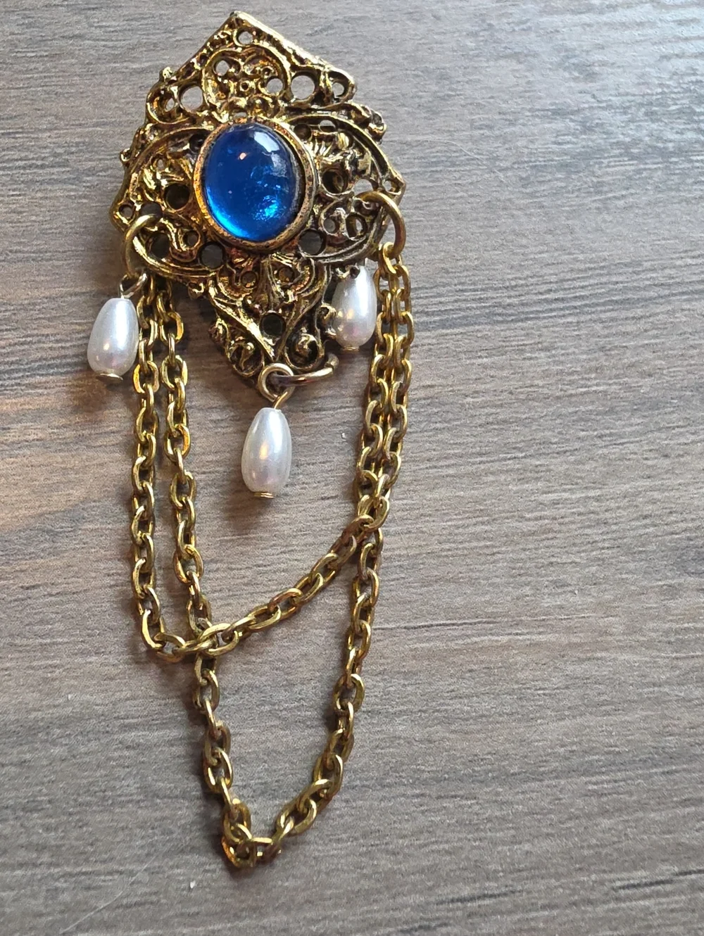 Gold Filigree Brooch with Blue Cabochon and Pearl Drops